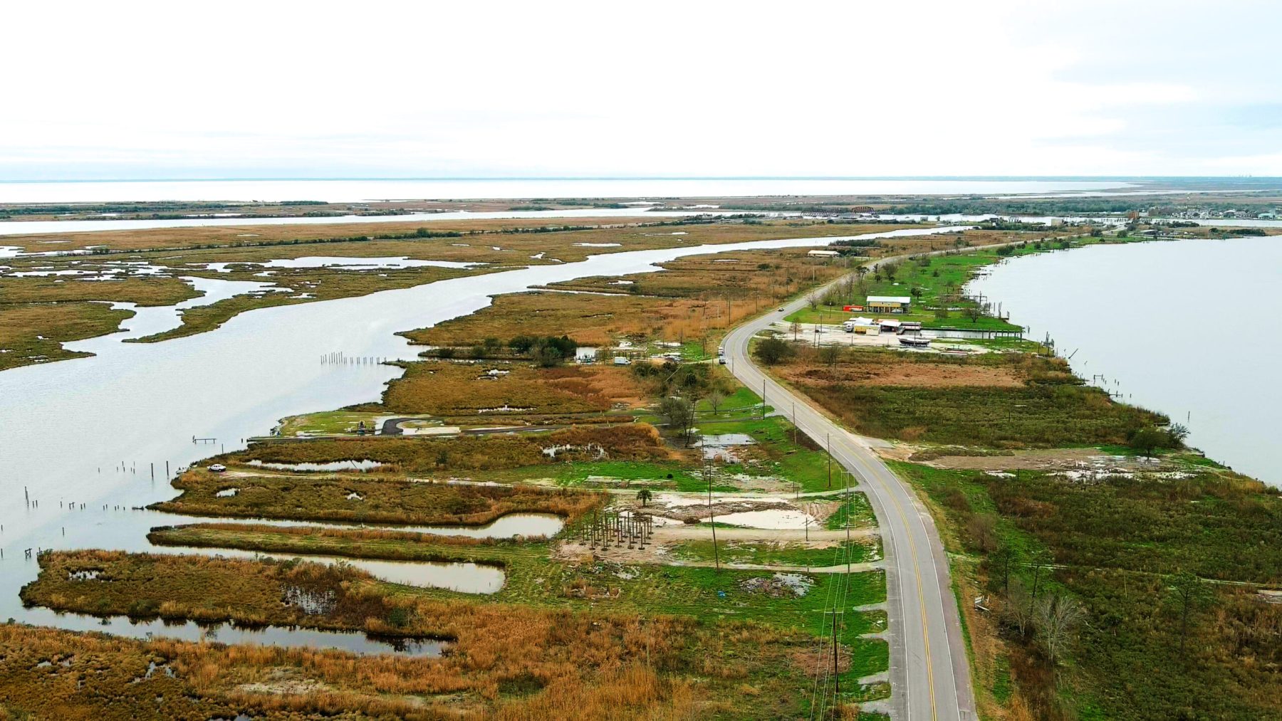 Wide aerial shot of the community and lake